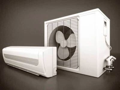 Ductless mini-split air conditioning unit, including the indoor wall-mounted evaporator and outdoor condenser unit, designed for efficient cooling in individual rooms or basements.